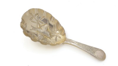 Lot 389 - A Victorian silver-gilt caddy spoon