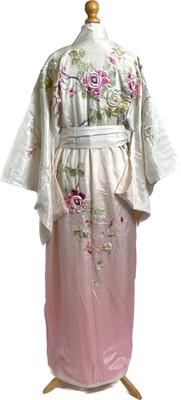 Lot 1140 - A late Meiji / early Showa Japanese (1926-1988) variegated blush pink silk kimono and belt