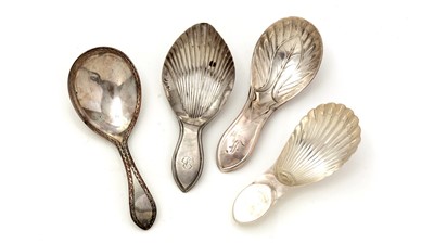 Lot 410 - Three George III/IV North Country provincial silver caddy spoons; and another