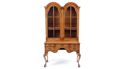 Lot 1410 - A good quality Queen Anne style reproduction burr walnut and walnut double dome cabinet on stand