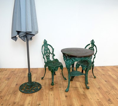 Lot 22 - A set of Victorian style garden furniture painted in a green colourway