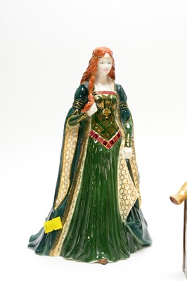 Lot 214 - Two Royal Worcester decorative ceramic figures of ladies; and a Royal Doulton figure