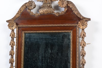 Lot 1307 - An American mahogany and gilt gesso parcel gilt wall mirror