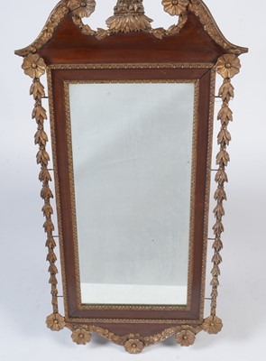 Lot 918 - An American mahogany and gilt gesso parcel gilt wall mirror