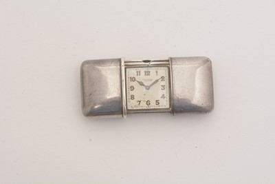 Lot 543 - Movado: an Art Deco 935 standard silver bag or purse watch