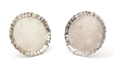 Lot 160 - George II - a pair of silver waiters