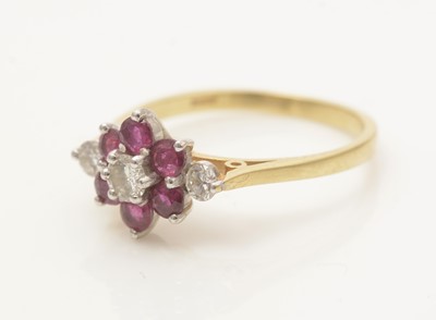 Lot 611 - A ruby and diamond ring
