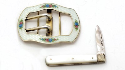 Lot 494 - A Continental silver-gilt penknife and enamelled buckle