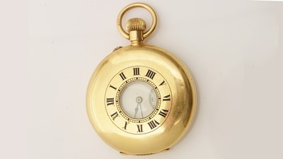 Lot 517 - Goldsmiths & Silversmiths Co Ltd (retailers): an 18ct yellow gold cased half-hunter pocket watch