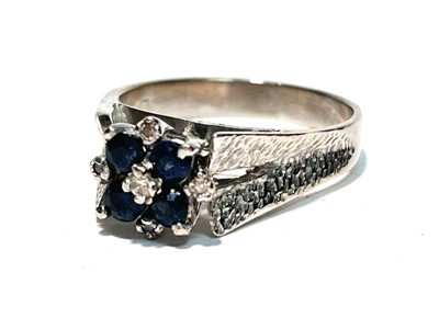 Lot 160 - A sapphire and diamond ring