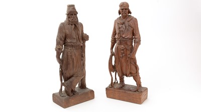Lot 740 - A pair of carved wooden figures, by H Garbati