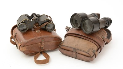 Lot 1064 - A pair of First World War binoculars, together with a pair of field glasses