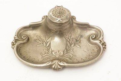 Lot 745 - An Art Nouveau pewter card tray and two ink wells