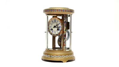 Lot 1252 - S Marti et Cie, Paris: a French champleve enamelled and gilt circular four glass mantel clock