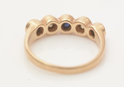 Lot 620 - A sapphire and diamond ring