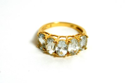 Lot 113 - A five stone aquamarine ring