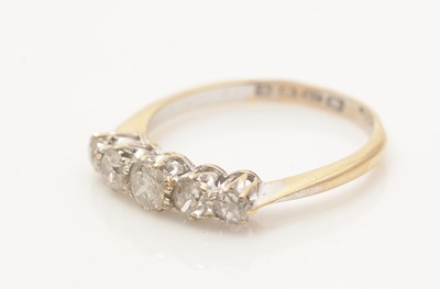 Lot 640 - A five stone diamond ring