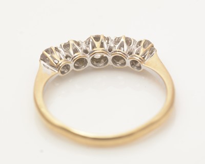 Lot 640 - A five stone diamond ring