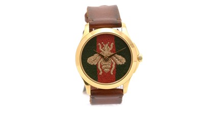 Lot 526 - Gucci: a gilt metal cased quartz wristwatch