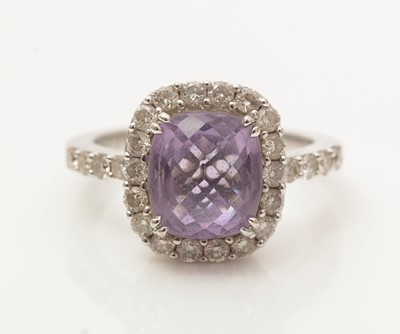 Lot 641 - An amethyst and diamond cluster ring