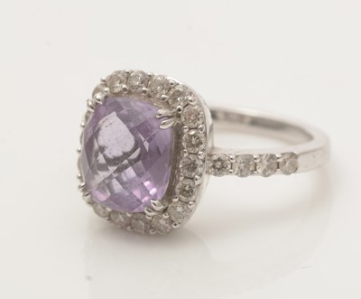 Lot 641 - An amethyst and diamond cluster ring