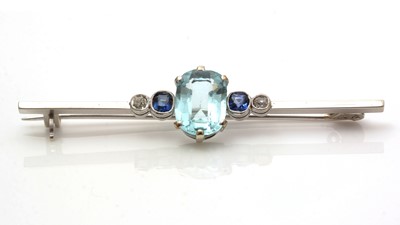 Lot 643 - A paste, sapphire and diamond bar brooch