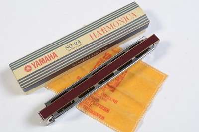 Lot 718 - J Michael clarinet, Yamaha tremolo harmonica