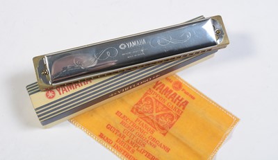 Lot 718 - J Michael clarinet, Yamaha tremolo harmonica