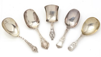 Lot 237 - Two Victorian silver caddy spoons; and three others