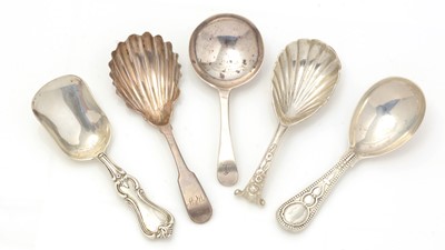 Lot 251 - Three various Victorian silver caddy spoons; and two others