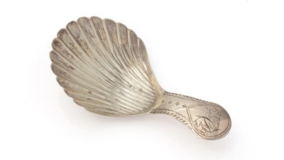 Lot 252 - A rare George III silver “double-duty” caddy spoon