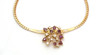 Lot 754 - A ruby, diamond and 18ct yellow gold necklace