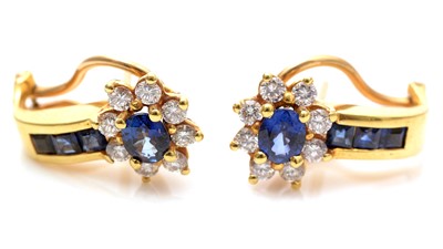 Lot 757 - A pair of sapphire and diamond earrings