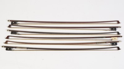 Lot 742 - Five violin bows and a viola bow