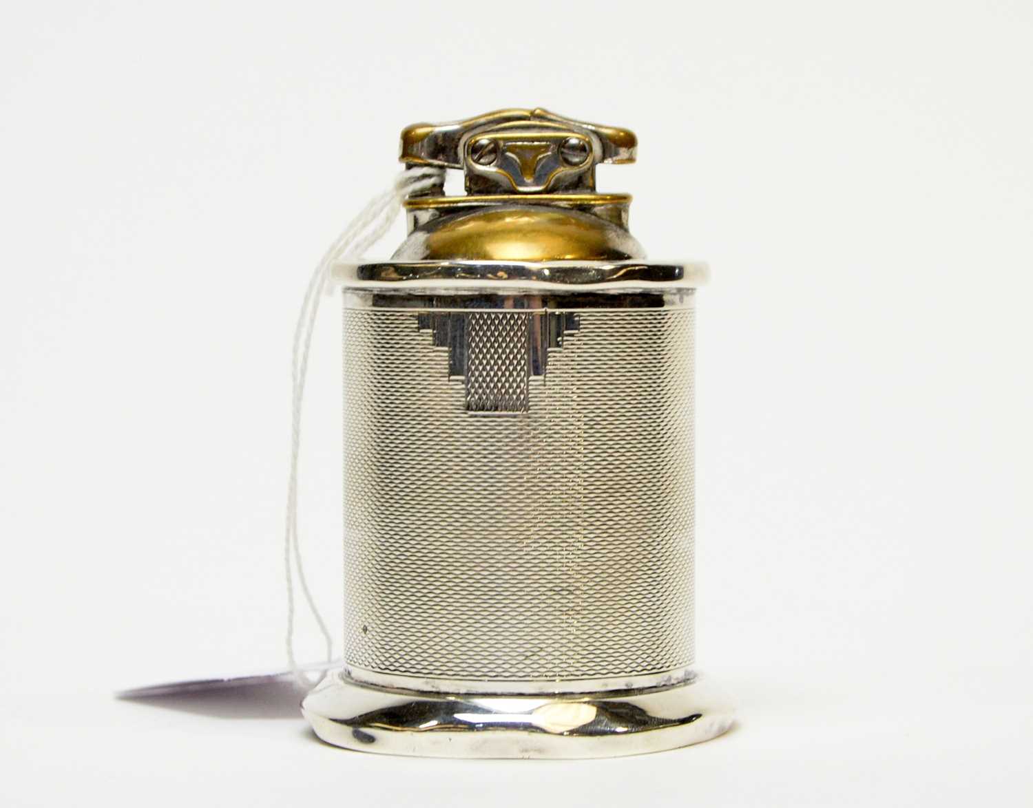 Lot 514 - An Art Deco silver cased table lighter, by Mappin & Webb