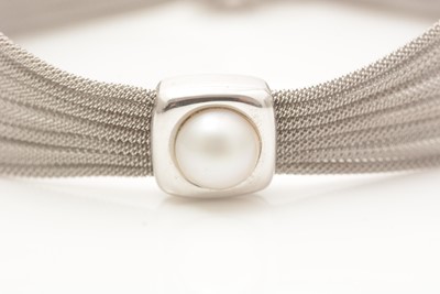 Lot 766 - An 18ct white gold and Mabe pearl choker necklace