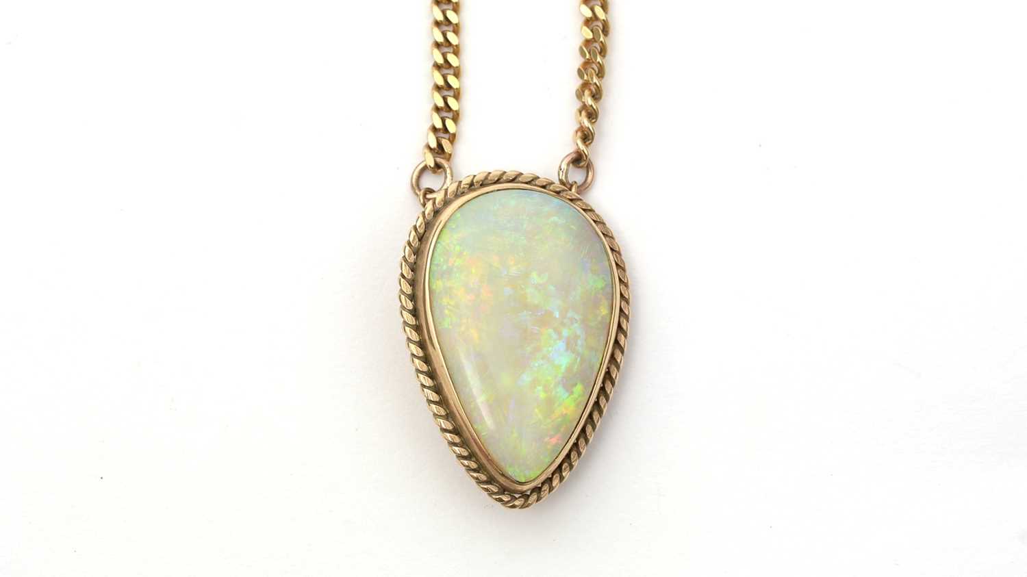 Lot 158 - An opal brooch pendant on chain