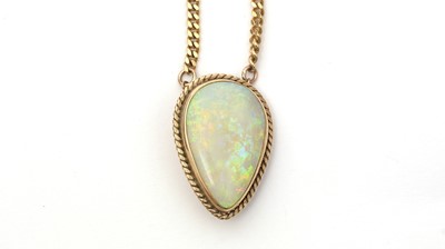 Lot 158 - An opal brooch pendant on chain