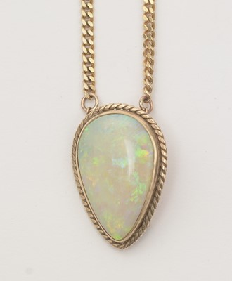 Lot 158 - An opal brooch pendant on chain