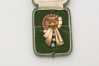 Lot 768 - A mid-20th Century citrine, ruby and diamond fur clip brooch