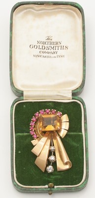 Lot 768 - A mid-20th Century citrine, ruby and diamond fur clip brooch