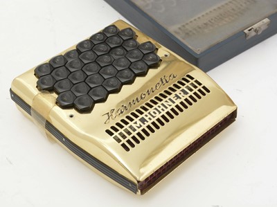 Lot 721 - A Hohner harmonetta