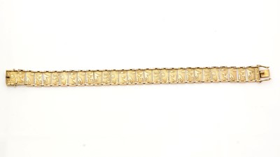 Lot 772 - A 14ct yellow gold bracelet of Egyptian design