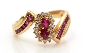 Lot 773 - A ruby and diamond double cluster ring