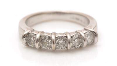 Lot 775 - A five stone diamond ring