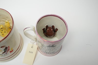 Lot 383 - Two Sunderland frog mugs and another.