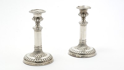 Lot 143 - A pair of George III silver library candlesticks