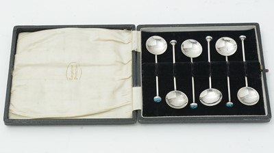 Lot 261 - A cased set of six silver arts and crafts coffee spoons