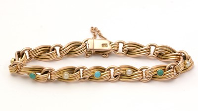 Lot 126 - A turquoise, split pearl and yellow gold bracelet