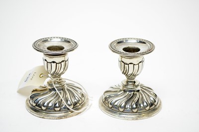 Lot 235 - A pair of Victorian silver candlesticks